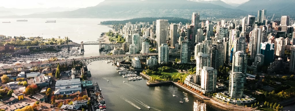 Aerial view of a city skyline with buildings, showcasing a panoramic perspective of urban architecture and cityscape