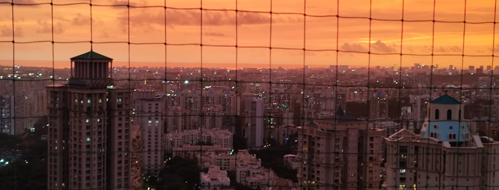 a view of a city at sunset
