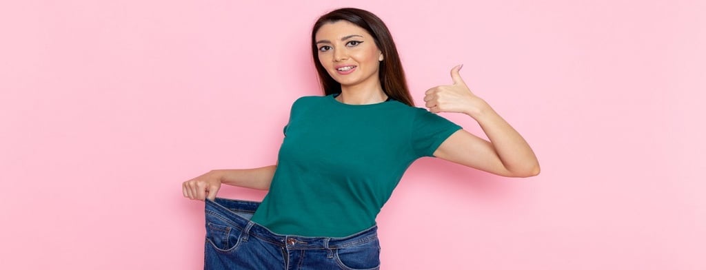 A girl holding her jeans