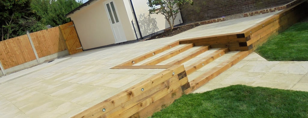 Large multi-level tiered garden makeover, sleeper retaining wall and steps elevated garden