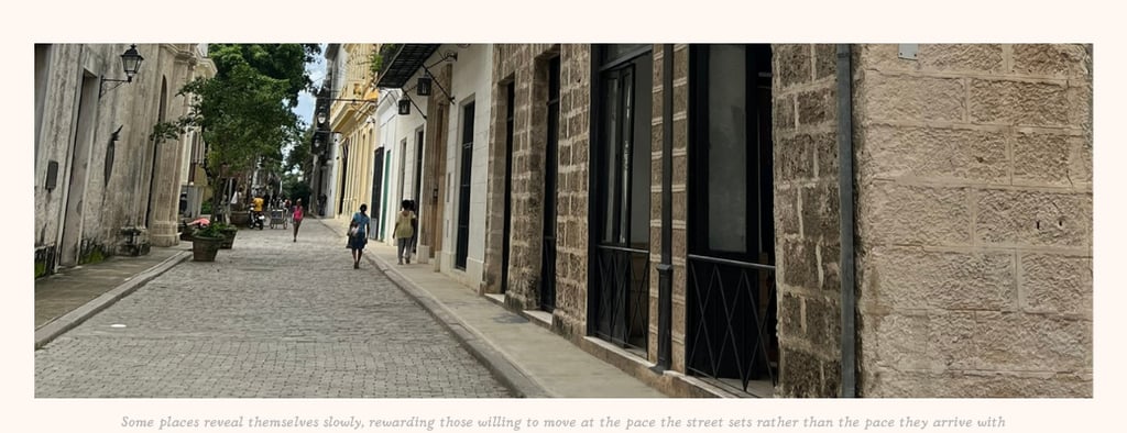 Havana city street with an outdoor cafe in the distance