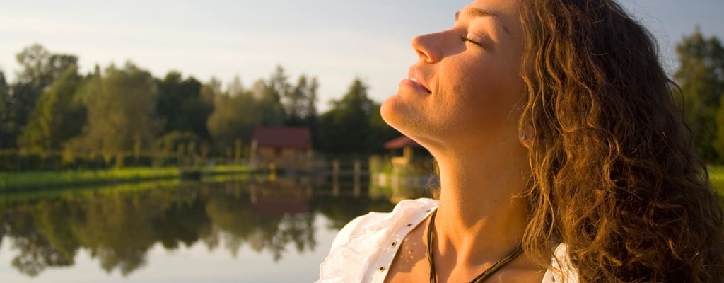 a woman with long hair and a necklace hypnosis, meditation for weight loss