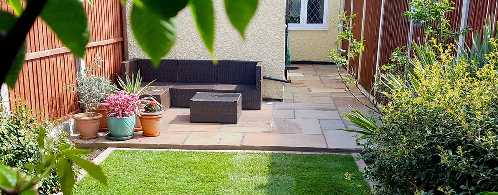 Small Sandstone Patio With New Lawn & Border Edging
