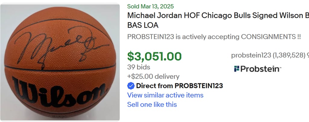 a michael jordan basketball ball with a signed signed basketball ball