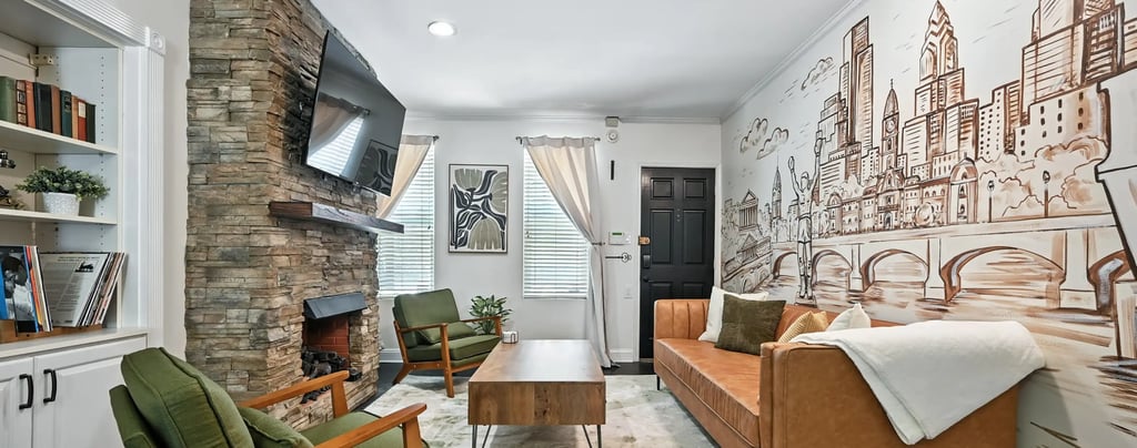 Airbnb living room with mural wall