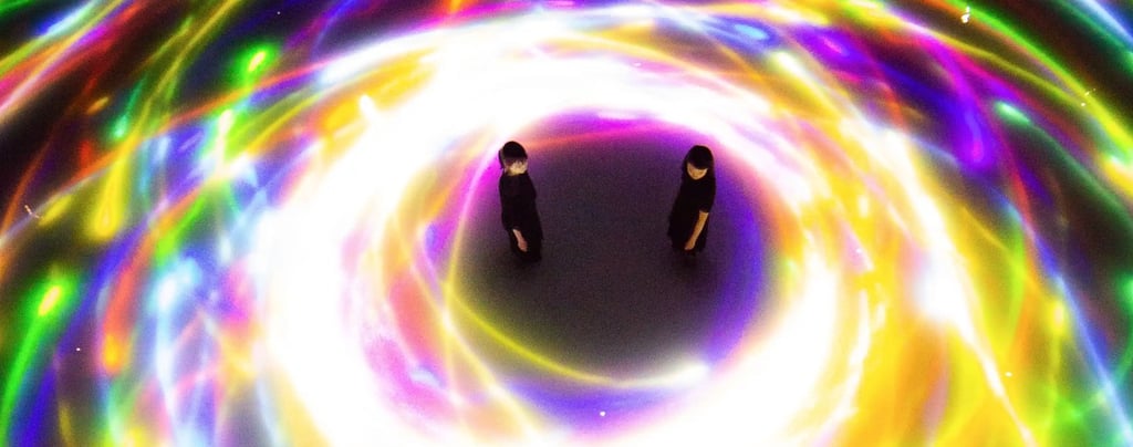 two people standing in a circle with a light that is glowing