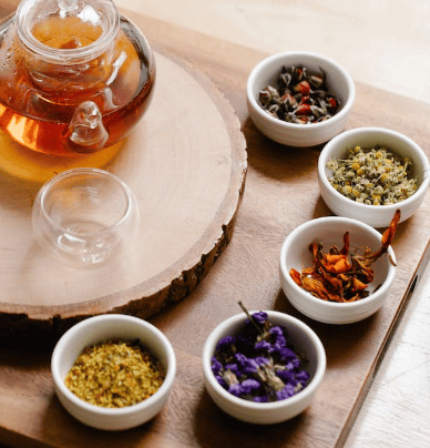 tea with different herb on side