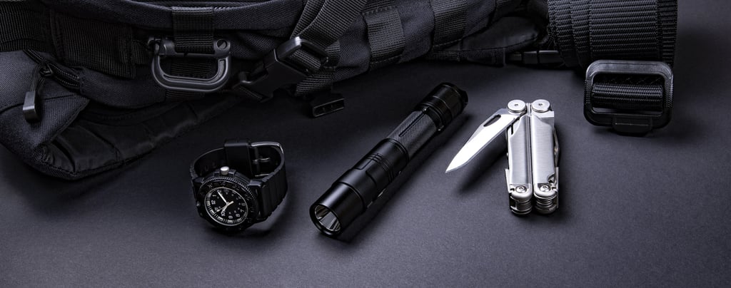 a backpacker's contents are laid out on a table edc everyday carry
