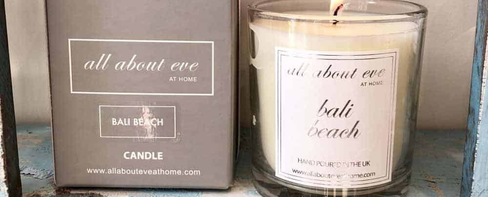 a candle that is sitting on a shelf