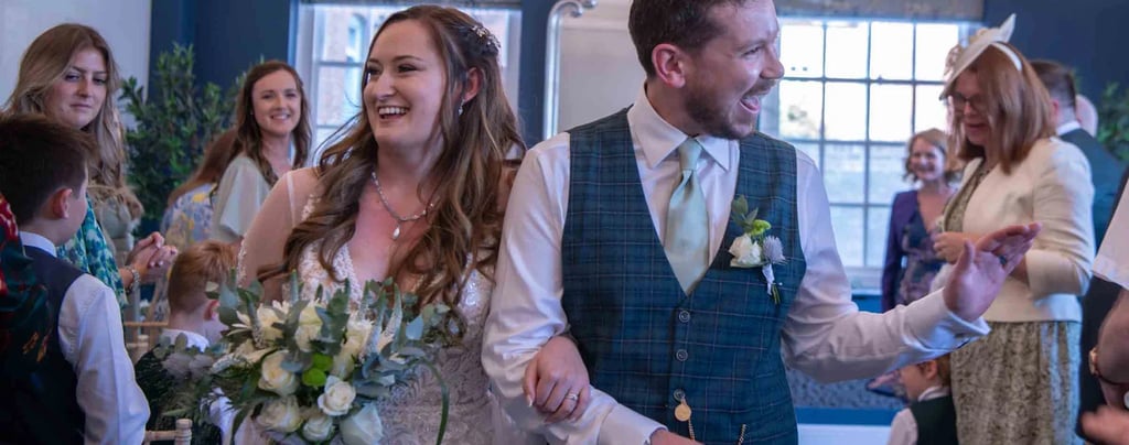 bride and groom walking down the aisle