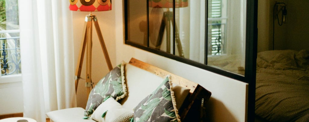 a couch with pillows and pillows in a room