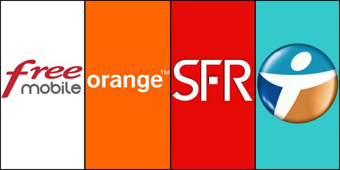 a group of people standing in front of a group of oranges