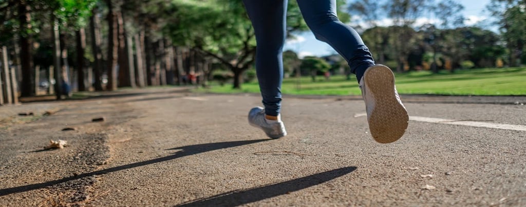 A Girl Running on the Road