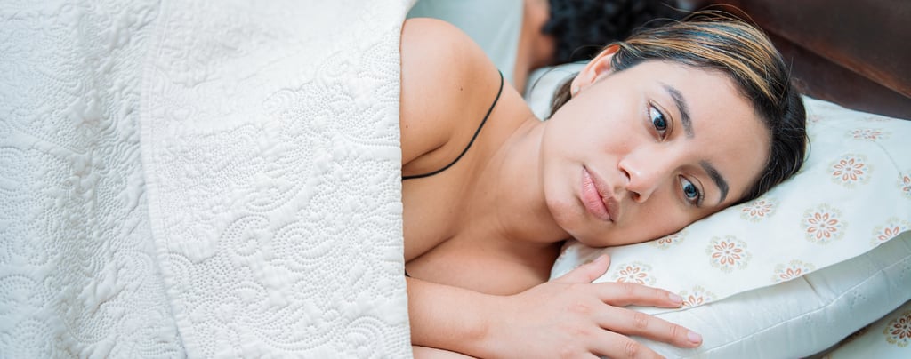 Upset couple sleeping on their backs