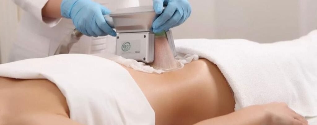 a woman is getting a laser treatment in a beauty salon