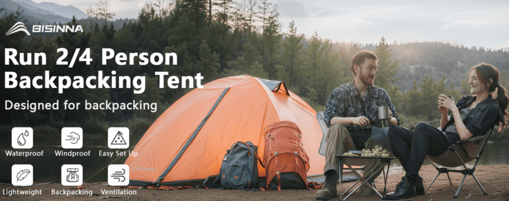 a man and woman sitting in chairs with a tent