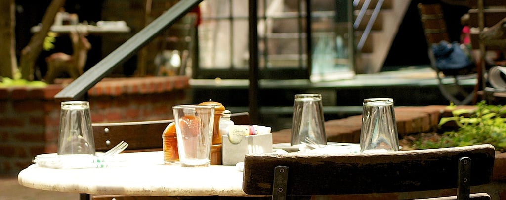 a table with a table with dishes petit dejeuner repas de midis lyon