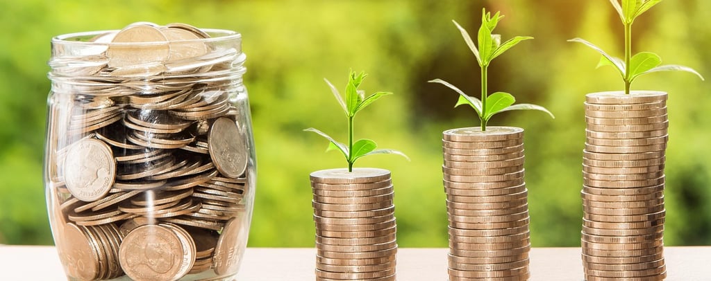a jar of coins and a jar of coins with a plant growing out of it