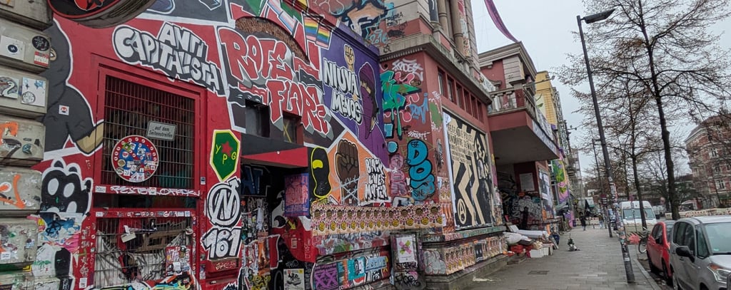 Rote Flora in Hamburg with graffiti and street art, St. Pauli Szene mit urbaner Kunst und alternativer Kultur