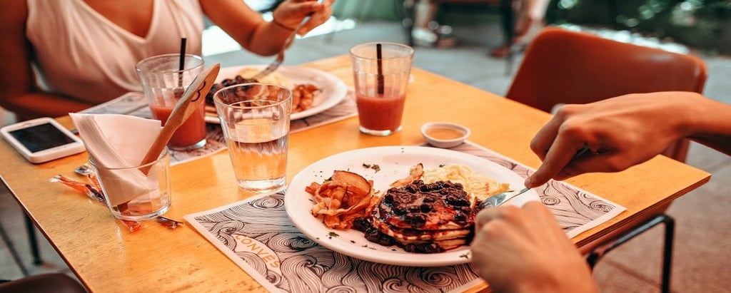 Woman having dinner in a restaurant