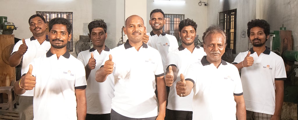 MP Asia Engineering Team With Thumbs Up posing on the plant