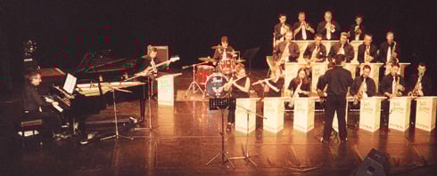 a bandleader playing a concert with a bandleader