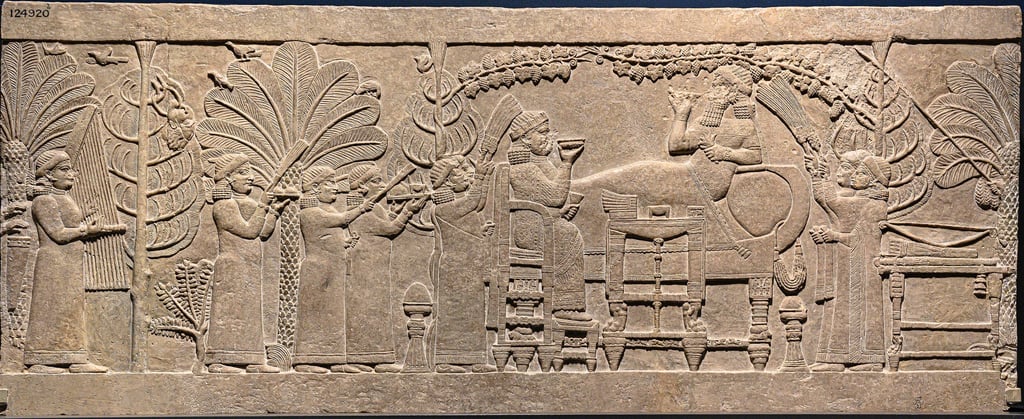 The "Garden Party" relief depicting Ashurbanipal with his wife. North Palace, Nineveh, c. 645 BC