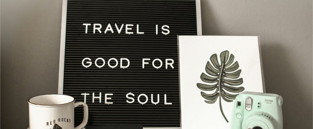 a sign that says travel is good for the soul