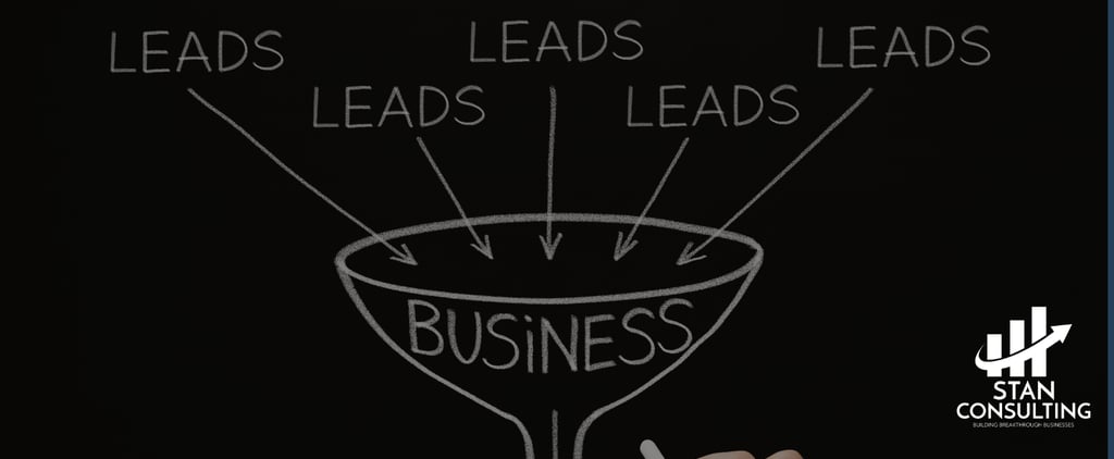 a person writing a business plan on a chalkboard