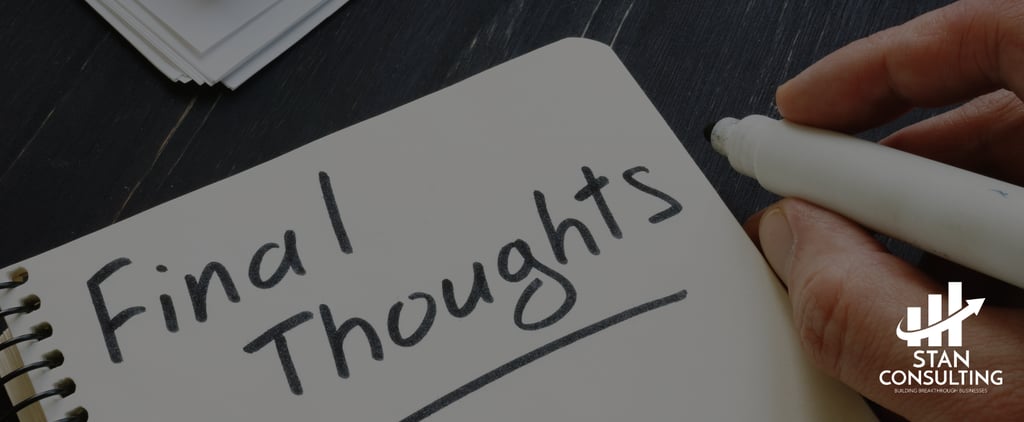 a person writing a notepad with a pen and a pen