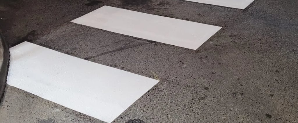 white crosswalk striped, new layout in the city