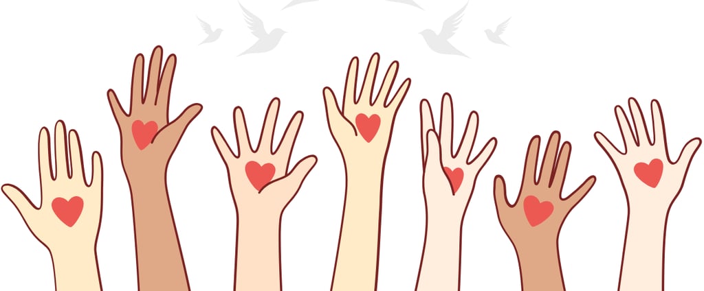 raised hands with a heart on each hand