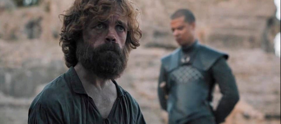 Tyrion Lannister standing in front of the council