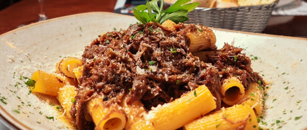 a pasta pasta pasta with meat and cheese