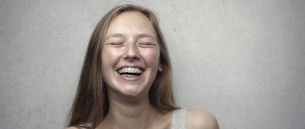 Photo by Andrea Piacquadio: https://www.pexels.com/photo/woman-in-gray-tank-top-laughing-3812740/