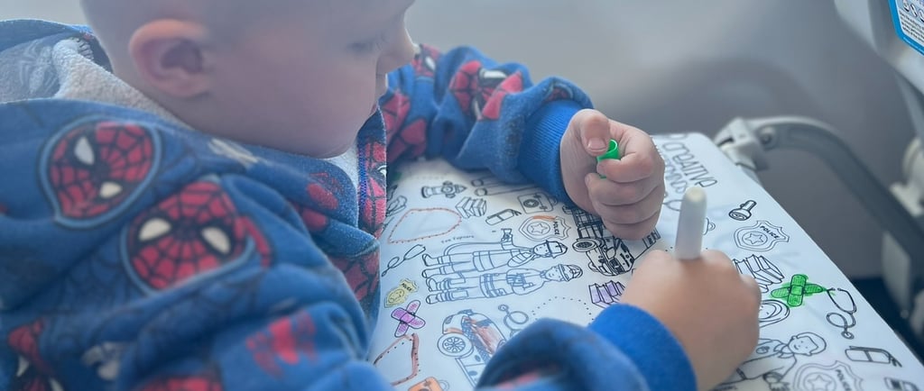 Scribbly Kids reusable drawing mats packed in travel tubes for on-the-go quiet play