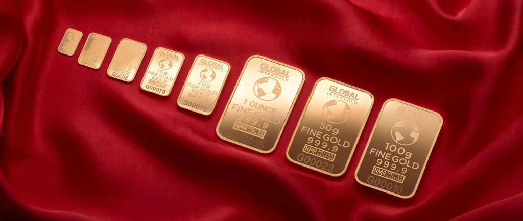 gold bars layed out in a row symbolizing blog post augusta precious metals, a gold ira company and why you should choose them