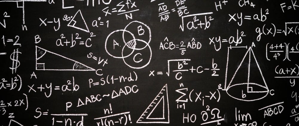 a blackboard with many different types of math