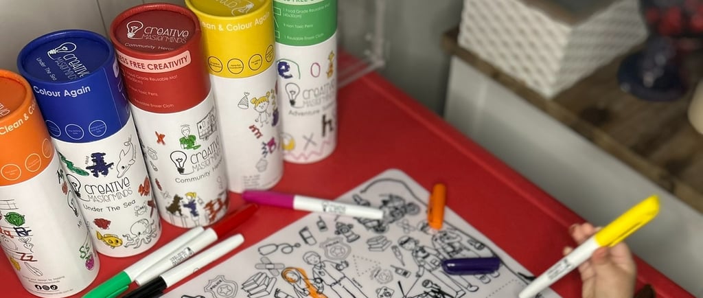 Parent and toddler enjoying mess-free drawing and early learning with Scribbly Kids mats