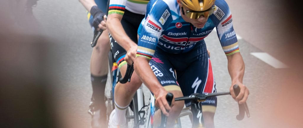 three pro cyclists riding in a race