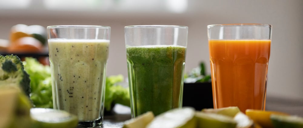 a table with a variety of fruits and vegetables