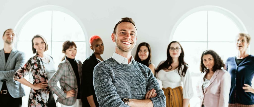 a man standing in front of a group of people