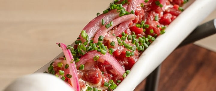 a long rectangular dish with a long, thin, thin, and thinly sliced