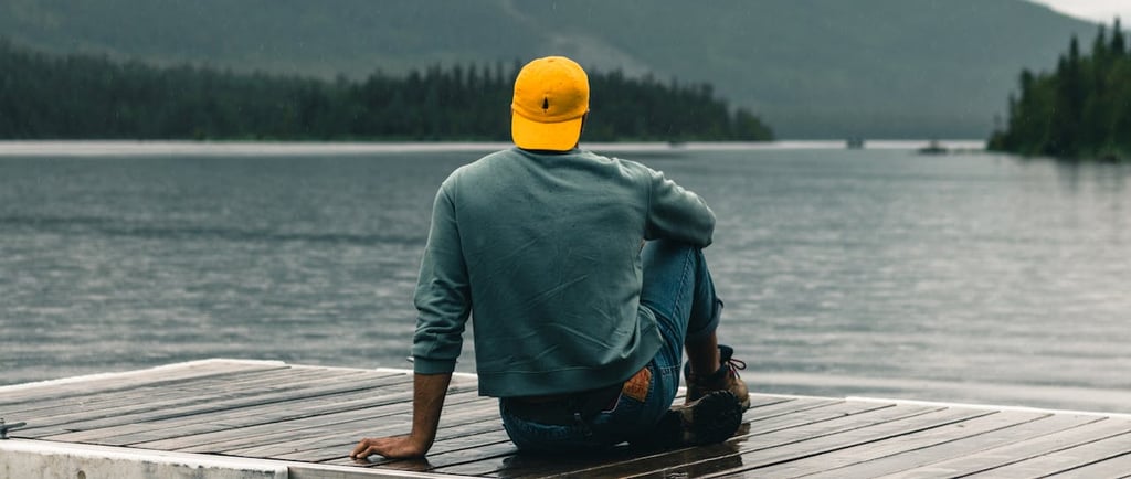 Photo by Ali Kazal: https://www.pexels.com/photo/man-sitting-on-a-promenade-and-looking-at-the-horiz