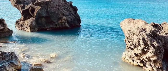 a rocky beach near a body of water