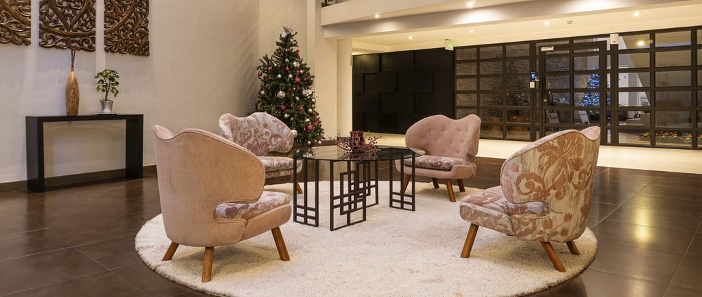fotografía inmobiliaria en quito ecuador edificio metroplaza sala de estar con muebles