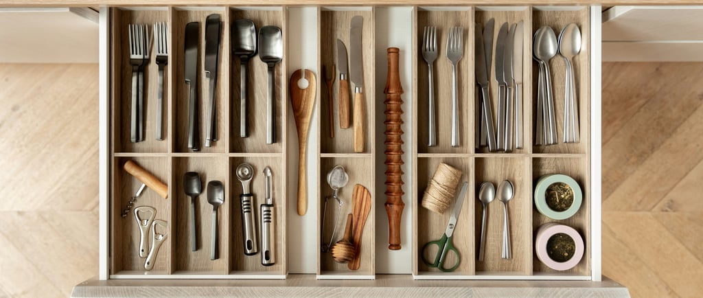 kitchen drawer with assorted kitchen utensils
