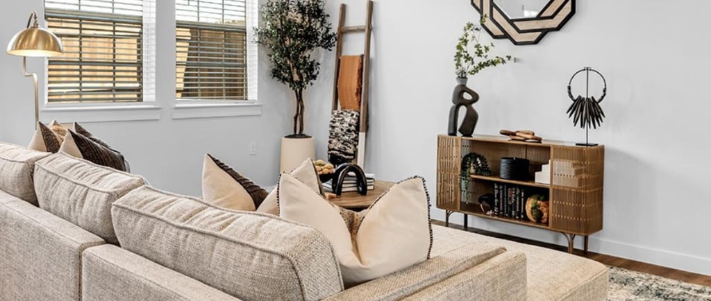 a living room with a couch and a television