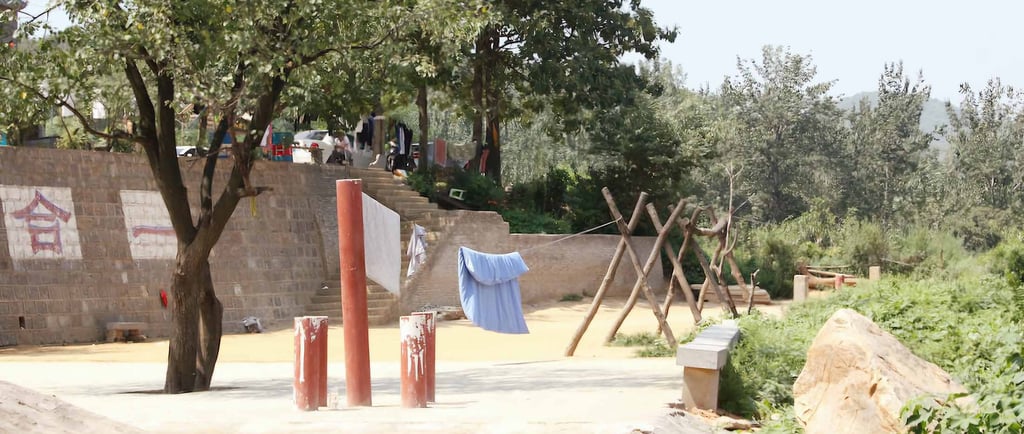 a clothesline with clothes hanging on a clothes line