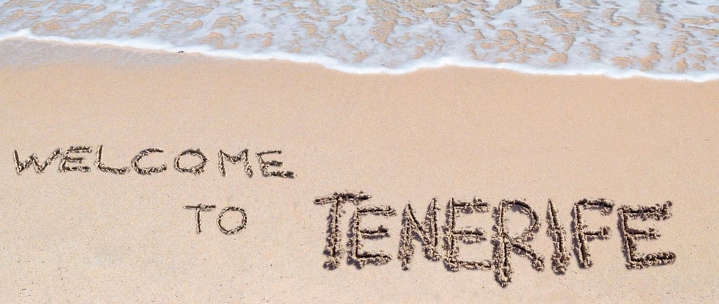 foto de boas vindas na areia em tenerife
